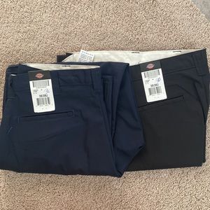 Two navy blue and black Dickies Flex  pants 35/30U